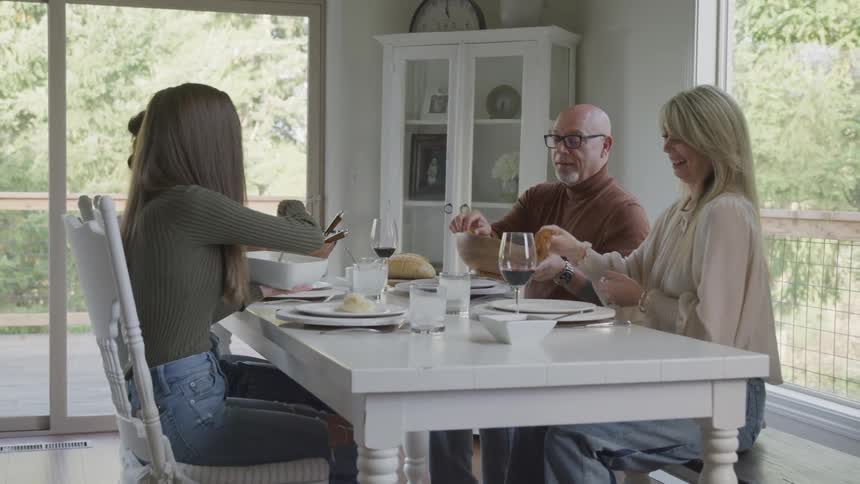 A family shares a meal together