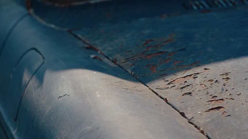 Rusty and peeling bodywork of a vehicle
