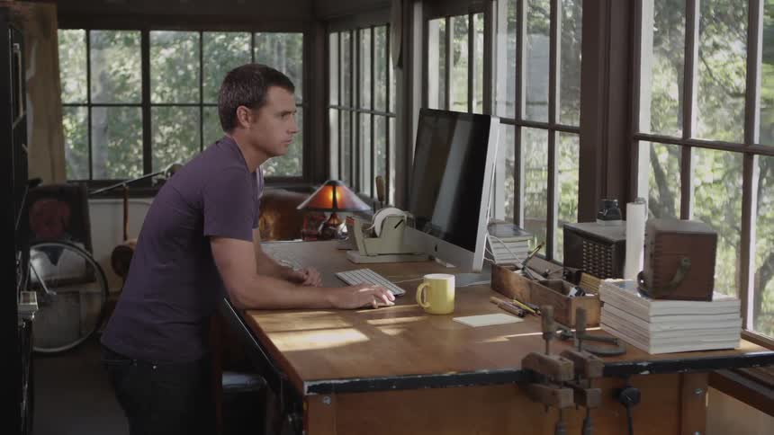 Man works at a computer