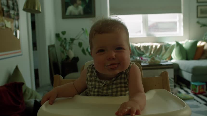 A baby spits up her food