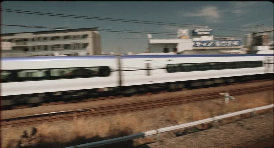 A passenger train leaves the platform