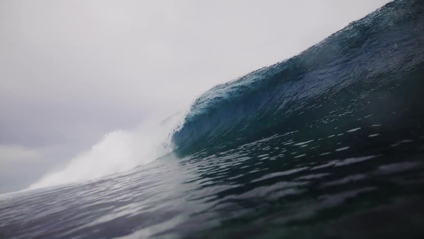 Wave in the ocean breaking gently
