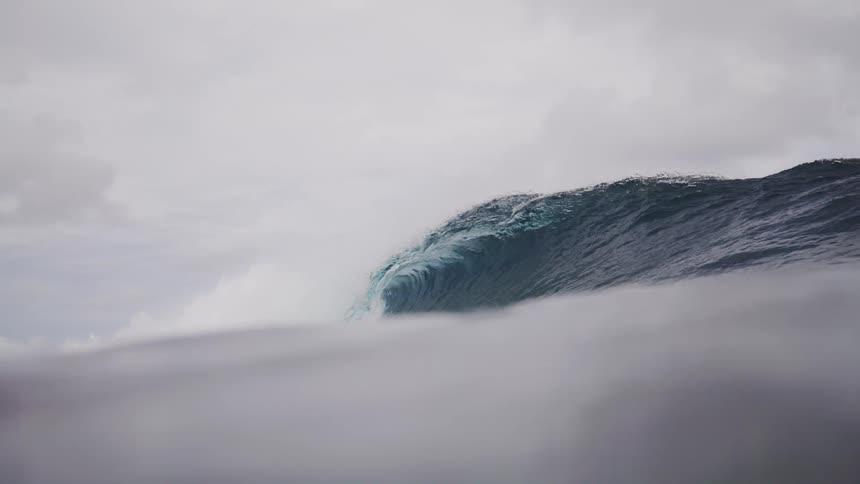 Ocean landscape with a breaking wave