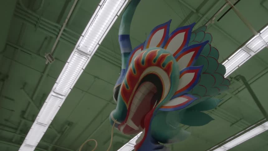 Decorative dragon hanging from the ceiling of a store