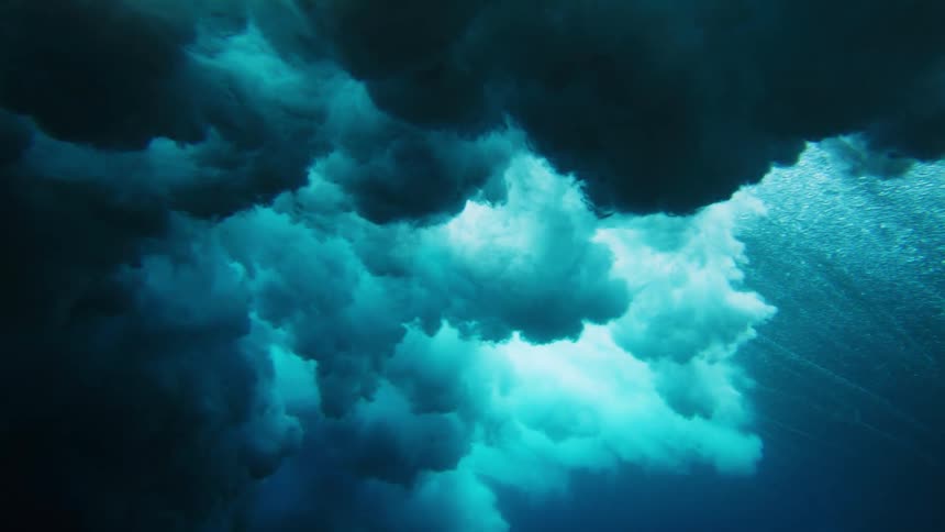 A large wave makes clouds underwater