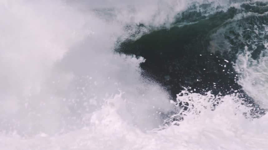 Large tubular wave with force and breaking foam