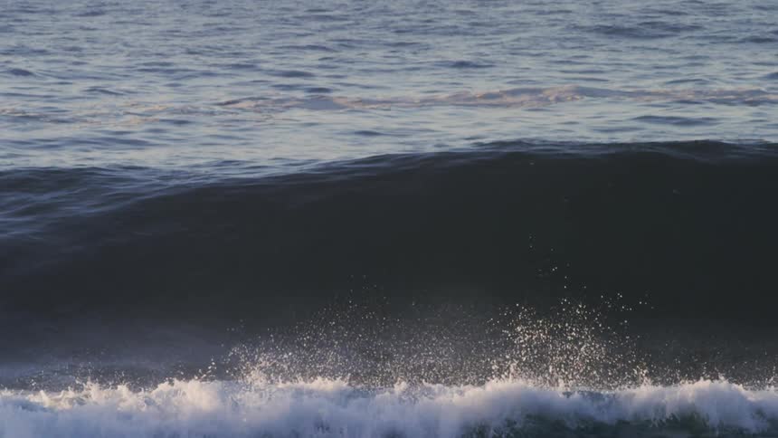 Waves crashing in the ocean one morning