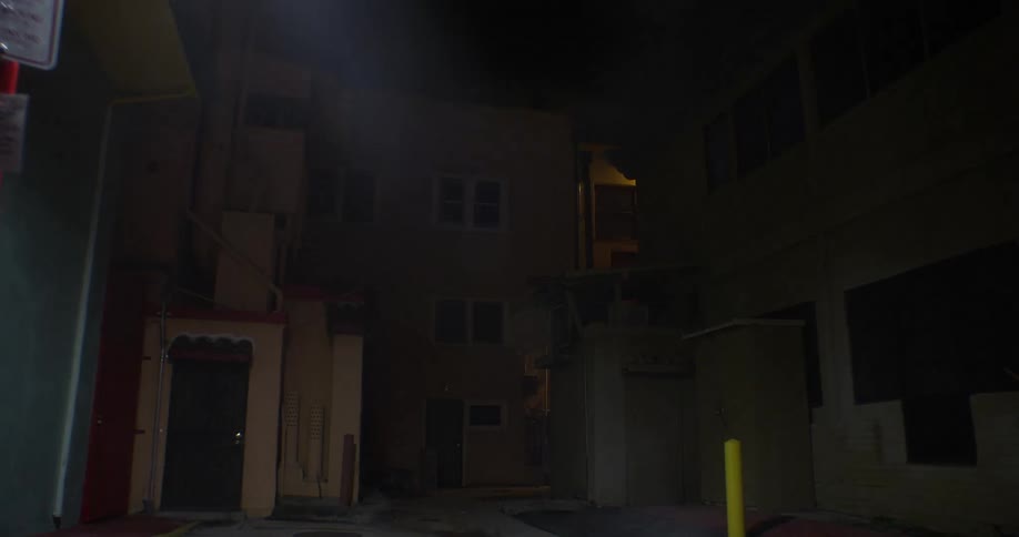 Boy skateboarding at night