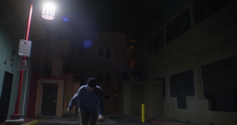 Boy skating at night