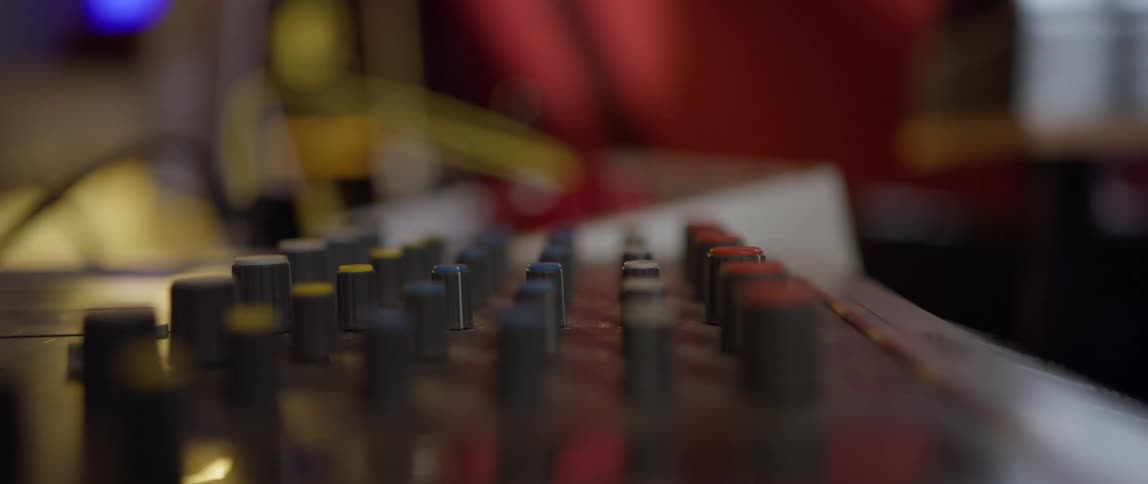 The soundboard has many knobs