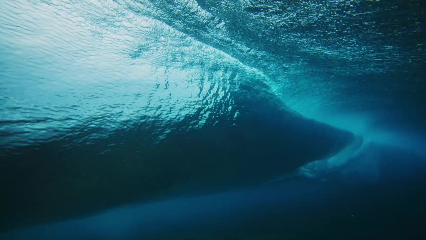 The blue water moves up and down