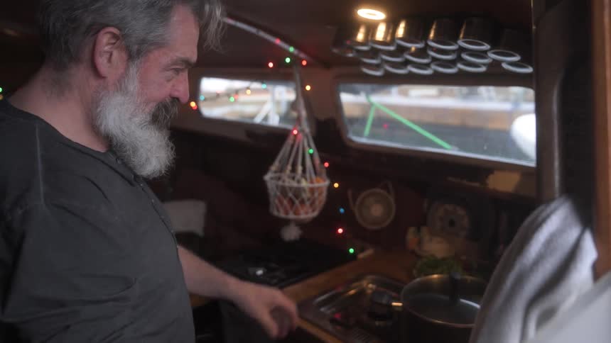 Man cooking on the boat