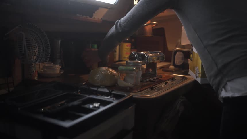 Person removing a bread machine from a box