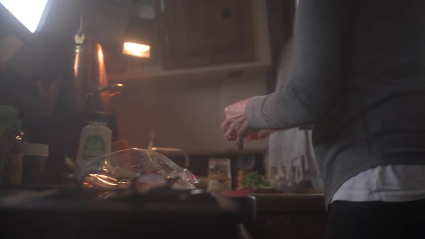 Hands of a person cooking
