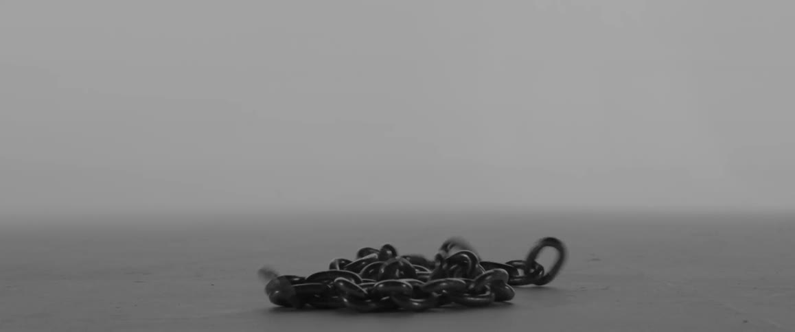 A chain falls to the ground