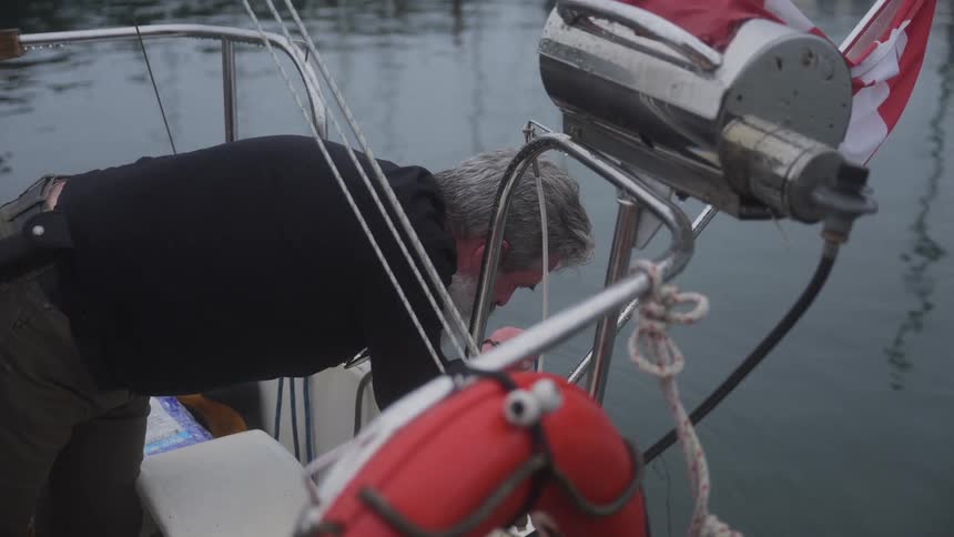 A footage of an elderly man fishing