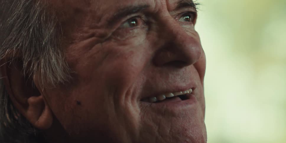 A footage of an elderly man smiling