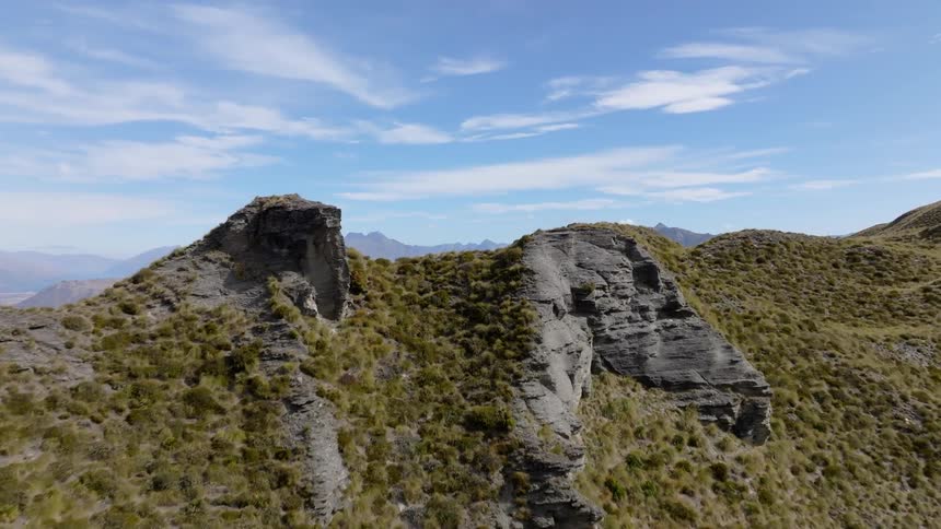 Over a hill reveals a large valley