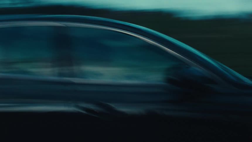 Black car in motion