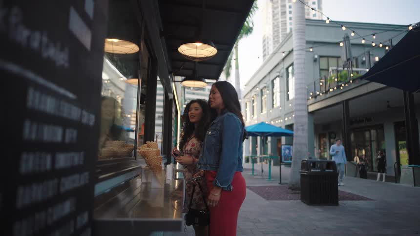 Two women are ordering ice cream