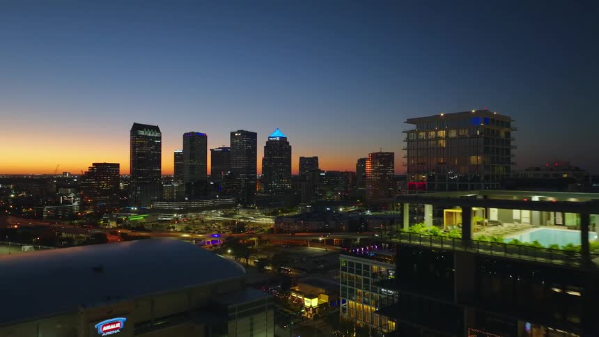 Aerial view of a metropolis illuminated at night