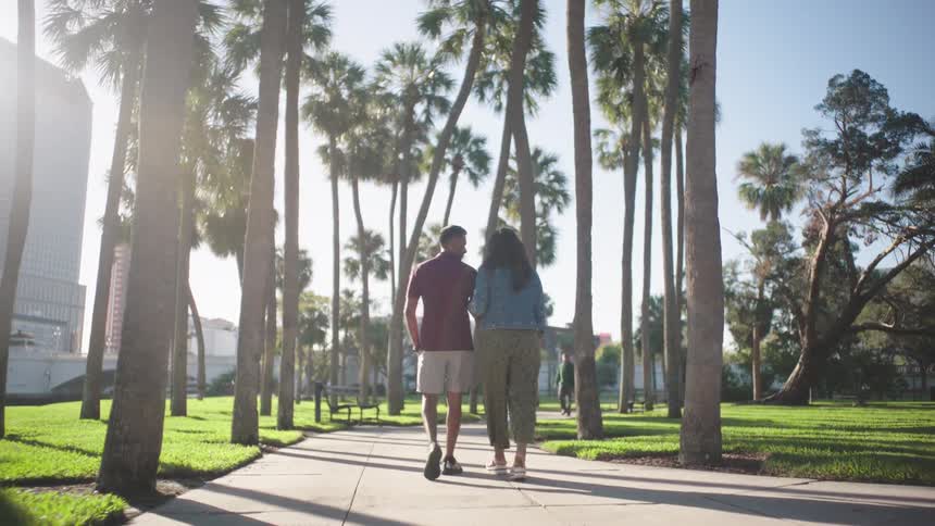 A footage ofa couple walling the path