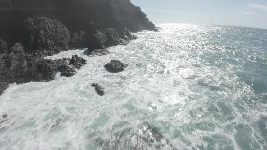 Aerial landscape of a mountain with cliffs by the sea