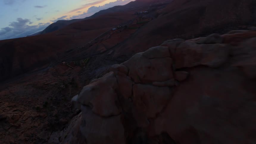 The brown mountains stretch over the landscape