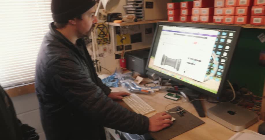 A footage of people operating a computer