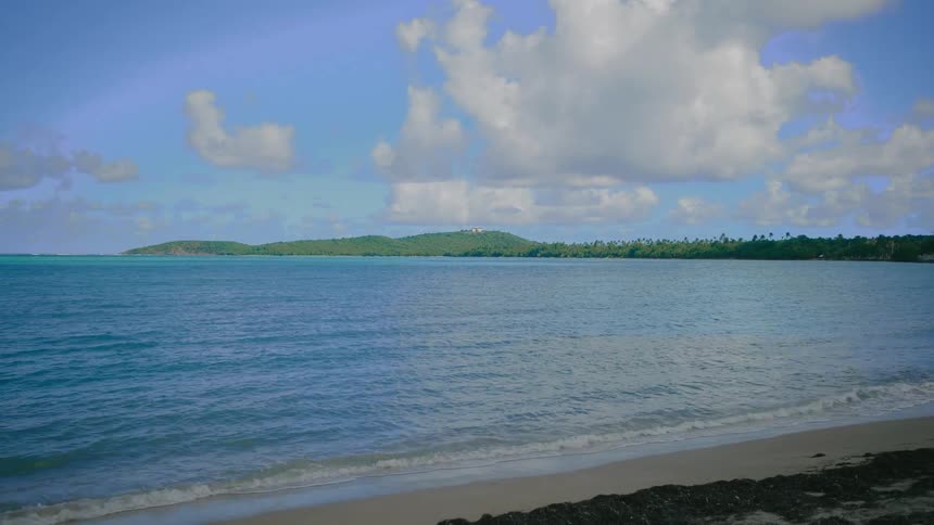 The island is green with blue water