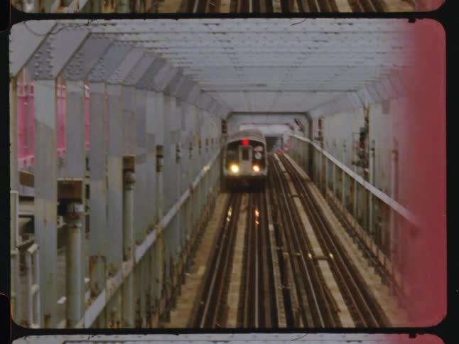 A train moves down the rail road tracks
