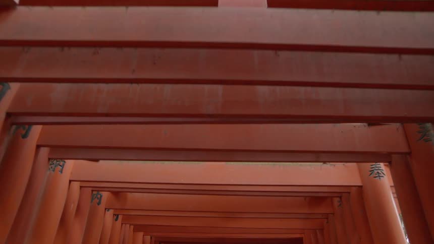 An orange wooden archway
