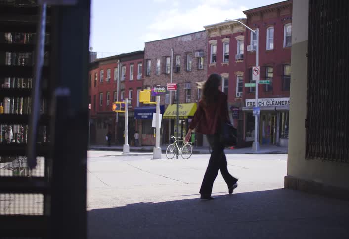 Urban road in a city with pedestrians and cyclists