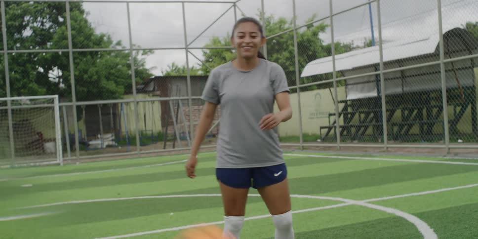 3 women having fun playing soccer