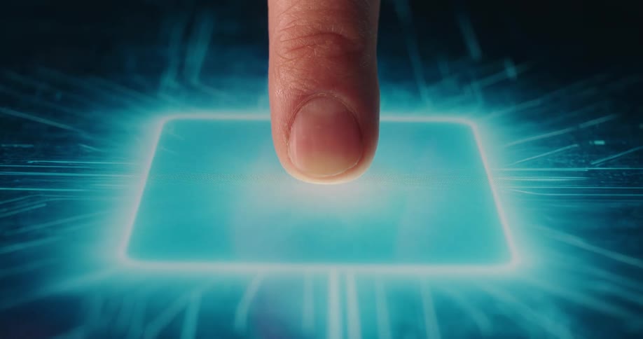Finger pressing a blue digital board