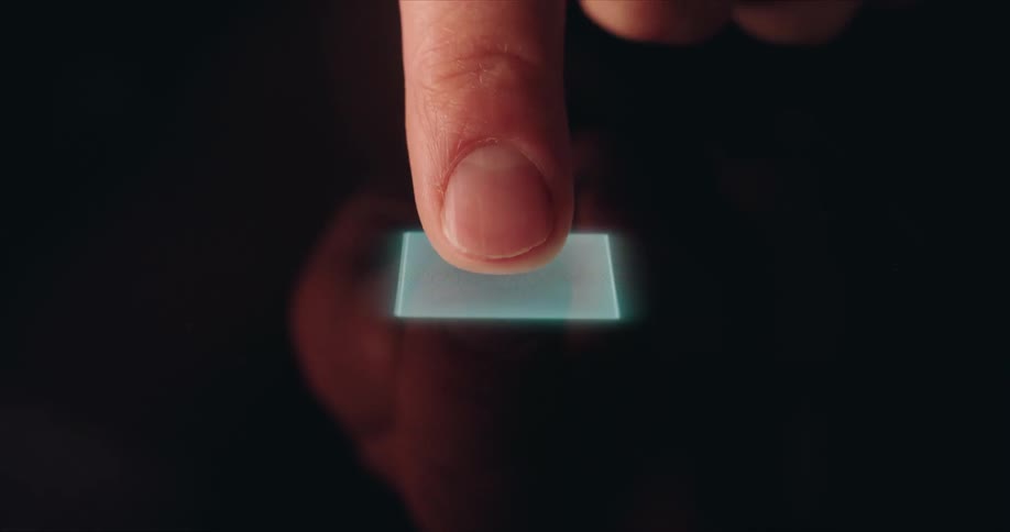 Finger touching a digital surface with circuitry