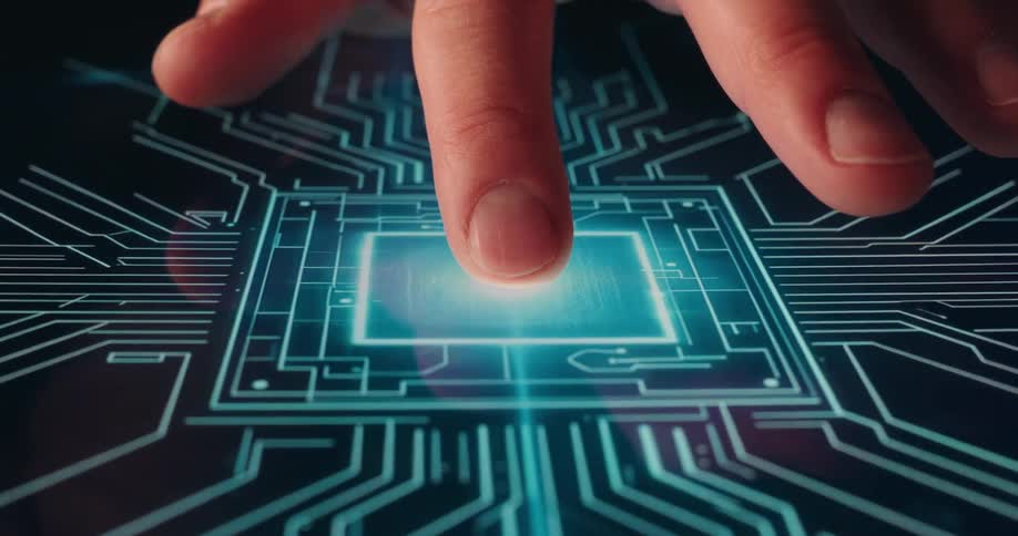 Finger touching a digital surface with blue illuminated circuits