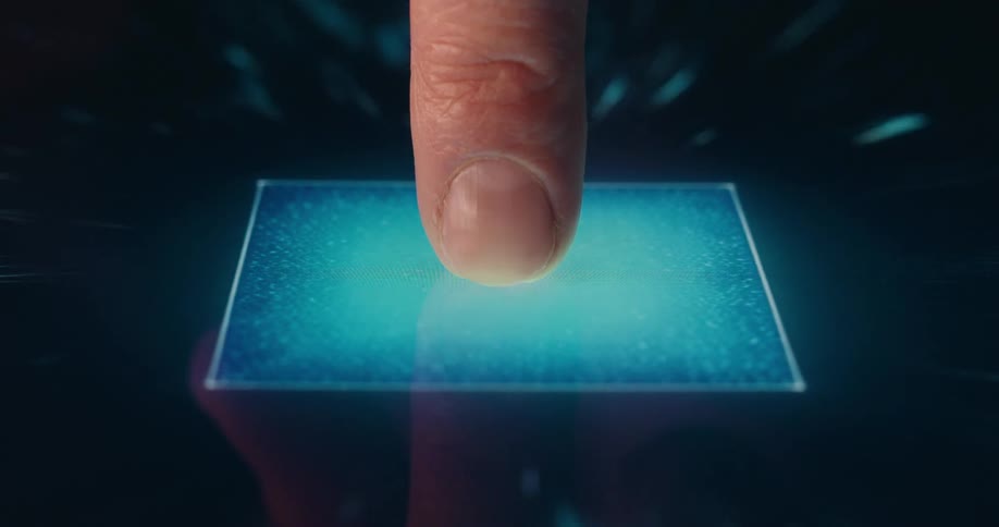 Finger touching the center of a digital interface