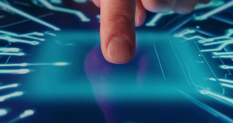 Finger touching the center of a blue digital interface with electronic circuits