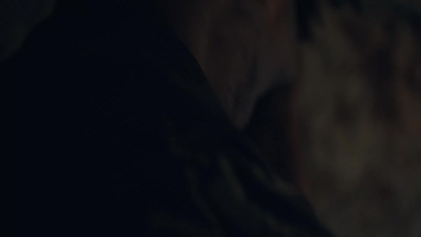 Person walking through a cave