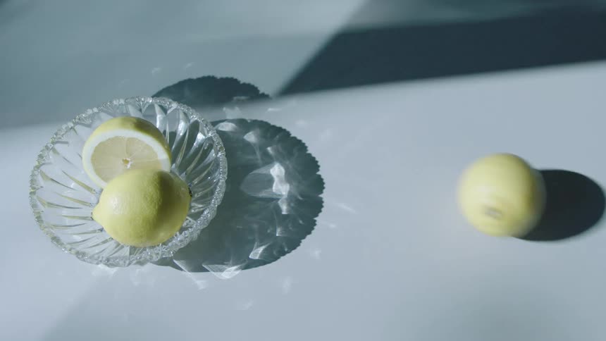 A close up clip of lemons in a bowl