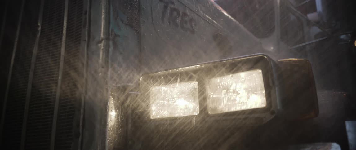 Heavy rain is pouring on the truck