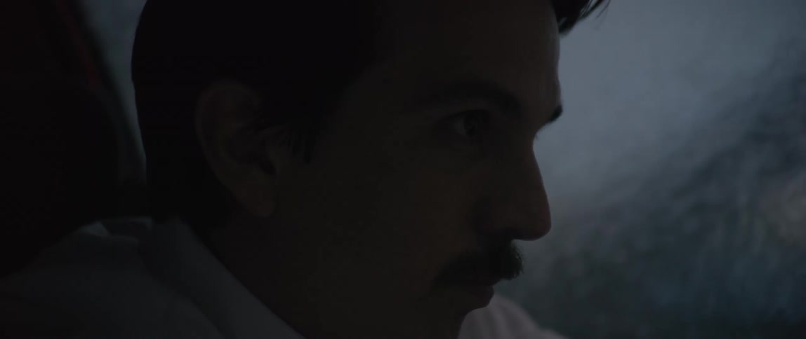 Man in a car driving concentrated