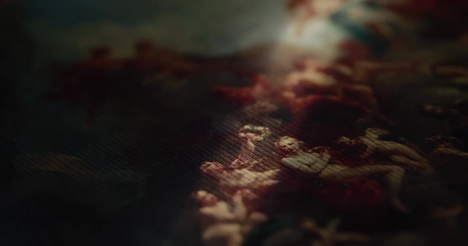 A painting is lying in the dark room