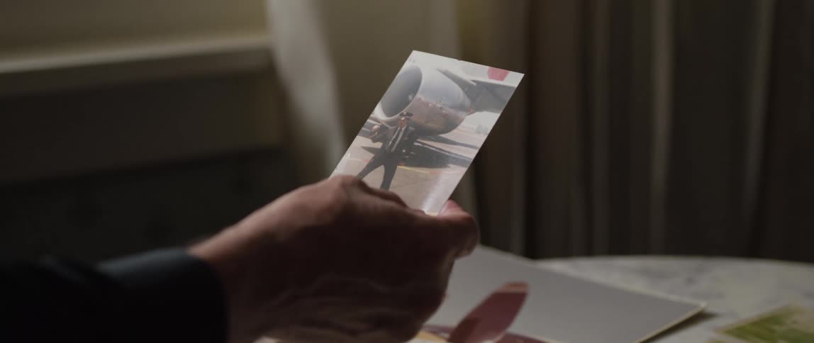Hand seeing a photograph