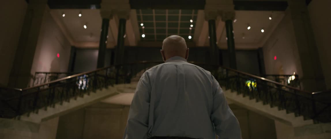 A man walks through the lobby
