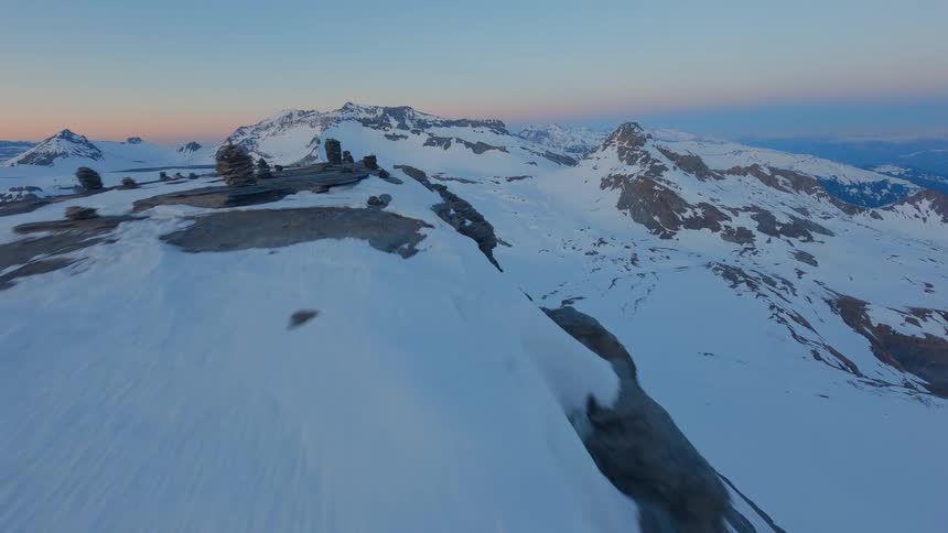 Drone Shot Over Snow-Capped Peaks