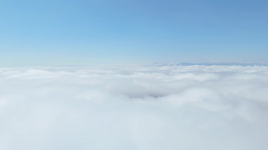 Aerial scene of blue sky and a sea of clouds