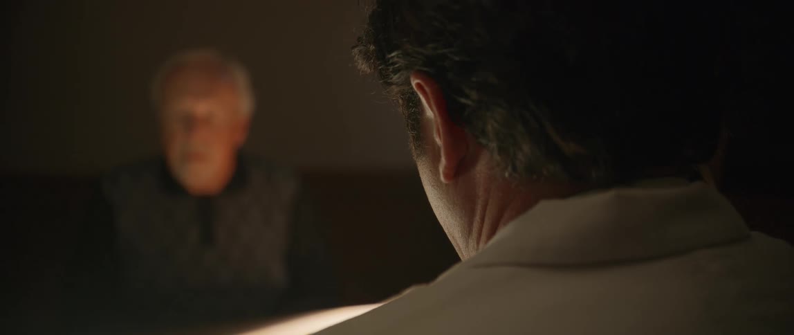 A man is being interviewed