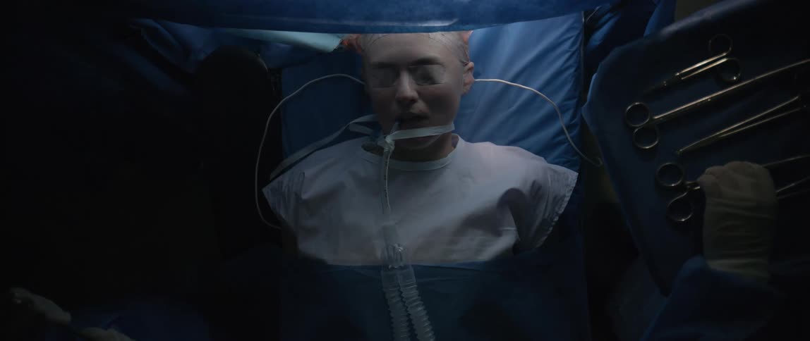 A patient is being prepped for surgery on the surgery table